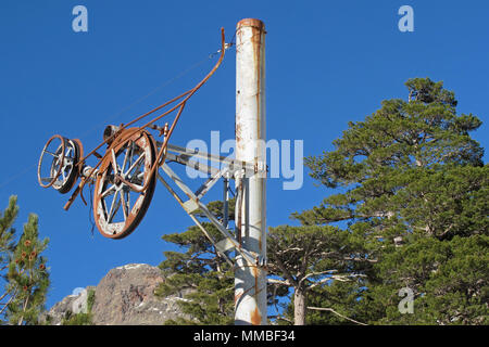 Old rusty pillar of an abandoned skilift in the Ese valley, Corsica, France Stock Photo