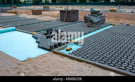 Heap of interlocking paving stones Material for paving works on