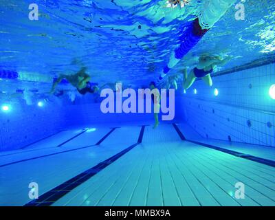 Olympic athlete and Team USA Olympic swimmer Kim Vandenberg observes swimmers from the Stuttgart Piranhas during her visit to Sindelfingen on Sunday, Sept 10, for a swim clinic. Stock Photo