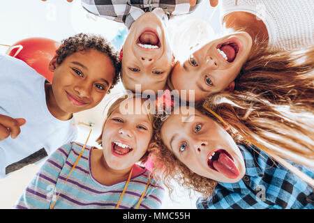 Group of children friends laughing and having fun Stock Photo