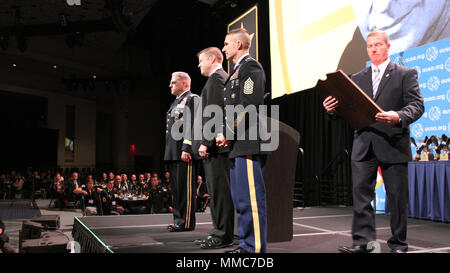 U.S. Army Central Command's leadership attended the 2017 Association of the United States Army conference 8-11 Oct. in Washington D.C. At the Dwight D. Eisenhower luncheon Army Chief of Staff Gen. Mark Milley and Command Sergeant Major of the Army Dan Dailey present awards to soldiers. Stock Photo