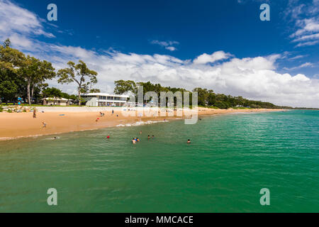 HERVEY BAY, AUS - APRIL 1 2018: People enjoying nice summer day on a beach in Hervey Bey ...
