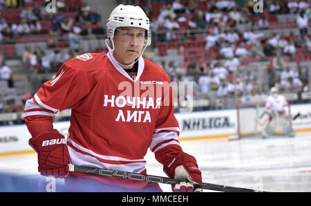 Sochi, Russia. 10th May, 2018. Russian President Vladimir Putin, #11, in action during the Night Hockey League match at the 7th Russian Amateur Ice Hockey Festival in the Bolshoy Ice Dome May 10, 2018 in Sochi, Russia.  (Russian Presidency via Planetpix) Credit: Planetpix/Alamy Live News Stock Photo