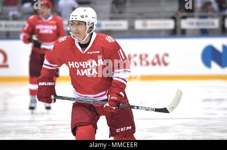 Sochi, Russia. 10th May, 2018. Russian President Vladimir Putin, #11, in action during the Night Hockey League match at the 7th Russian Amateur Ice Hockey Festival in the Bolshoy Ice Dome May 10, 2018 in Sochi, Russia.  (Russian Presidency via Planetpix) Credit: Planetpix/Alamy Live News Stock Photo