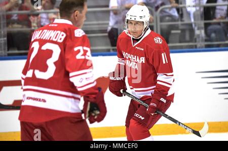 Sochi, Russia. 10th May, 2018. Russian President Vladimir Putin, #11, in action during the Night Hockey League match at the 7th Russian Amateur Ice Hockey Festival in the Bolshoy Ice Dome May 10, 2018 in Sochi, Russia.  (Russian Presidency via Planetpix) Credit: Planetpix/Alamy Live News Stock Photo