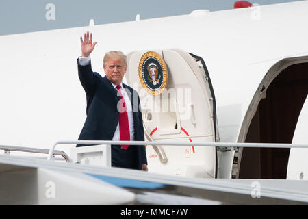 United States President Donald Trump waves as he boards Air Force One at Joint Base Andrews in Maryland on May 10, 2018. Erin Schaff/Pool via CNP /MediaPunch