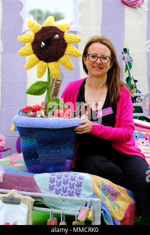 RHS Malvern Spring Festival - Friday 11th May 2018 - Clare Young with her knitted garden called Work of Heart Garden in memory of her late husband Ken  - the 4m x 4m garden features a hospice bedroom overgrown with knitted plants - the project supports the Sue Ryder Leckhampton Court Hospice - Photo Steven May / Alamy Live News Stock Photo