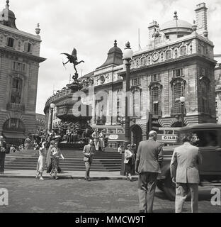 1950s, view of Piccadilly Circus from Lower Regent Street, London, England, UK when it was still a busy traffic roundabout. Seen is the Eros statue on top of the Shaftesbury Memorial fountain. Stock Photo