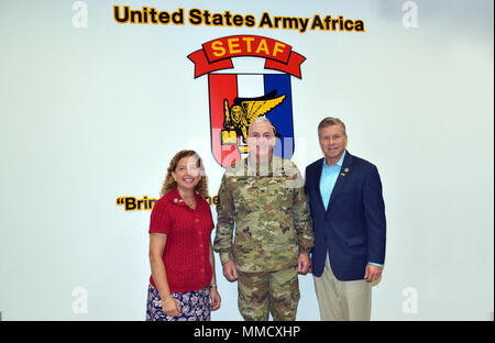 From Left, Congresswoman Debbie Wasserman Schultz, House Appropriations Committee, Brig. Gen. Eugene J. LeBoeuf, acting Commander of U.S. Army Africa, and Congressman Charles Dent, Chairman, House Appropriations Subcommittee on Military Construction and Veteran Affairs, pose for a photograph in the USARAF commander conference room during a visit to Caserma Ederle, Vicenza, Italy Oct. 16, 2017.   (Photo by Visual Information Specialist  Antonio Bedin/released) Stock Photo