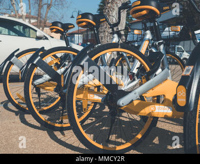 Rimini, Italy, March 21, 2018 many bike for rent are parked in the city. they are a way for to realize a green and ecological city Stock Photo