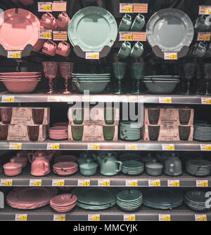 Rimini, Italy, March 21, 2018 more pink and green kitchen tools are on sell to shopping center Stock Photo