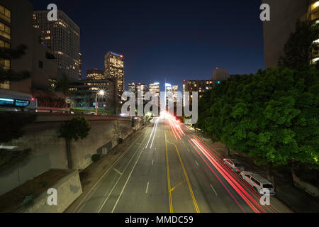 Downtown Los Angeles night traffic , long exposure with light trails through downtown streets Stock Photo