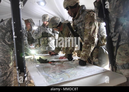 U.S. Army Reserve Soldiers conduct map reading training during CSTX 78-18-03, at ft. Knox, Ky., March 20, 2018. CSTX 78-18-03 is a Combat Support Training Exercise that ensures America's Army Reserve units and Soldiers are trained and ready to deploy on short-notice and bring capable, combat-ready, and lethal firepower in support of the Army and our joint partners anywhere in the world. ( U.S. Army Reserve Stock Photo