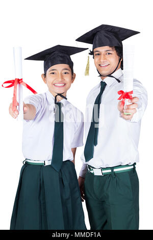 Two School students Classmate In graduation cap holding diploma certificate Stock Photo
