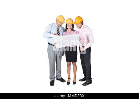 Construction management Checking blueprints;  Construction team business meeting.Real-Estate Project Stock Photo