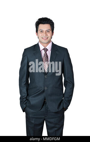 One Business male Employee Standing Hands-In-Pockets Posing Studio Shot Stock Photo