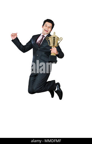 One Businessman Employee Holding Trophy Jumping Fun Winning Success Promotion Stock Photo