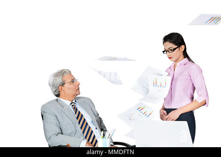 One Business male owner firing employee, flying Papers scared secretary Stock Photo