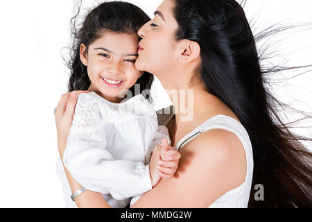 Happy Mother Giving A Kiss To Her Little Daughter Fun Cheerful Stock Photo