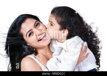 Happy Little Daughter Giving A Kiss To Her Mother Loving Fun Cheerful Stock Photo