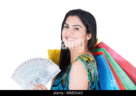 Happy woman holding shopping bags with Money Rupees Customer Buy Stock Photo