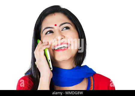 Close up of smiling One woman Housewife talking on cellphone Stock Photo