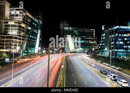 Blurred Motion -Fast moving cars at-night Highway -Road traffic India Nobody Stock Photo