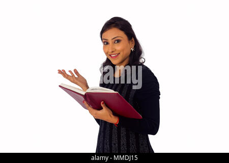 Free: Photo Of Woman Holding Book - nohat.cc