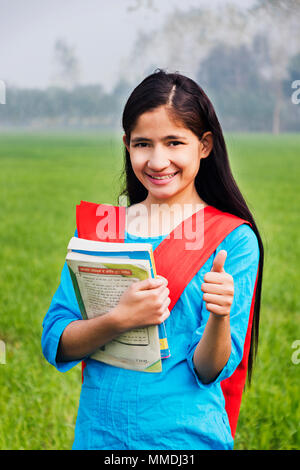 Rural Villager College Girl Student Showing Thumbs-up With Books Farm Stock Photo