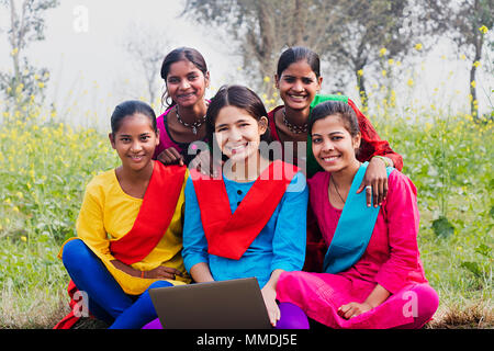 Group Teenager College Girls Students Laptop Working Education In-Farm Village Stock Photo
