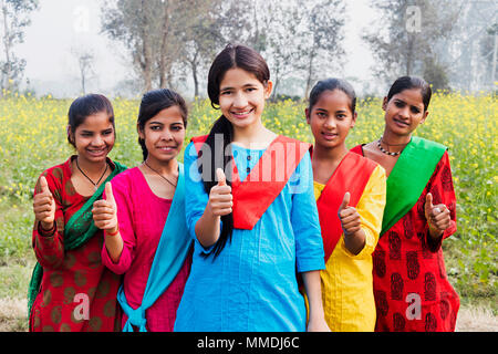 Group Young Teenage girls Friends Showing Thumbs-up Success At-Farm Stock Photo