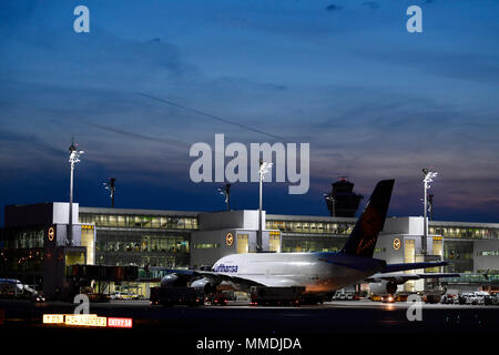 A 380-800, A380, Lufthansa, position, ramp, night, twilight, lights, sunset, Aircraft, Airplane, Plane, Airport Munich, MUC, Germany, Stock Photo