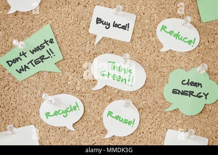 Speech bubbles with eco concept on pinboard Stock Photo