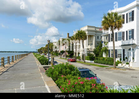 The battery - a historic defensive seawall, with its scenic promenade and pre-Civil War mansions, is a popular tourist attraction in Charleston, SC. Stock Photo