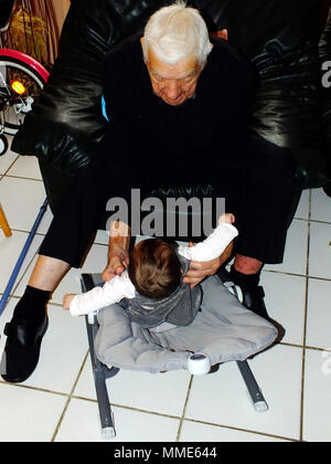 CENTENARIAN & BABY Stock Photo