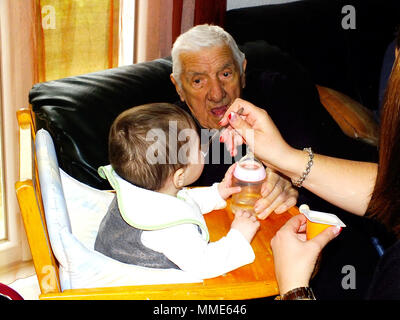 CENTENARIAN & BABY Stock Photo