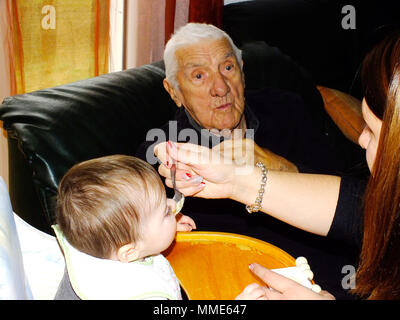 CENTENARIAN & BABY Stock Photo