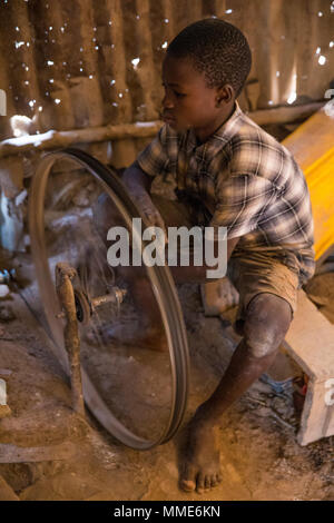 Smithy in Bohicon, Benin. Child worker. Stock Photo