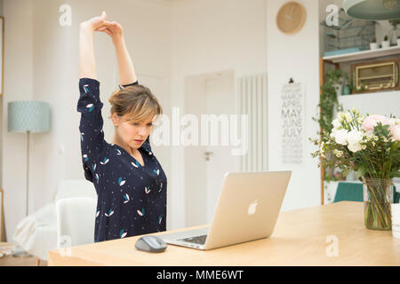 WOMAN STRETCHING Stock Photo