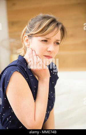 WOMAN WITH TOOTHACHE Stock Photo