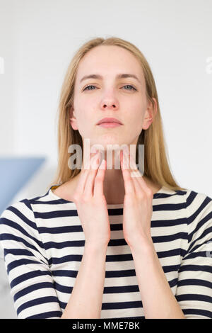 CONSULTATION, WOMAN IN PAIN Stock Photo