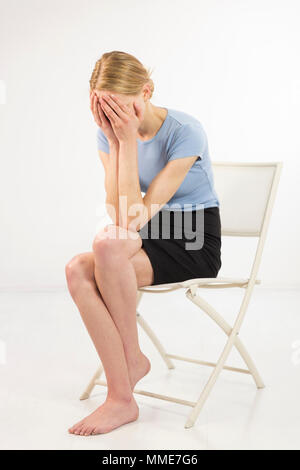 CONSULTATION, WOMAN IN PAIN Stock Photo