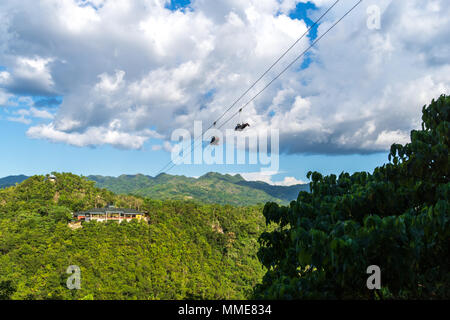 Tourists on the Zip Line at Bohol Island, Philippines Stock Photo