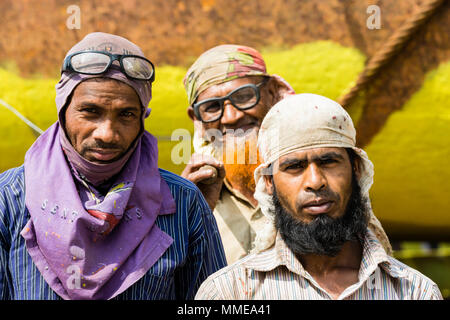 Dhaka, Bangladesh, February 24 2017: Portrait of three Muslims working as workers on the ship dock in Dhaka, Bangladesh Stock Photo
