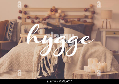 Big white text in the photo of cozy bedroom Stock Photo