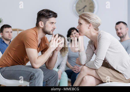 Two people during behavioral  psychotherapy in group Stock Photo