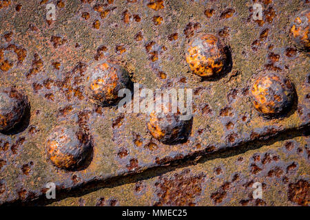 Rusted Metal with rivets Stock Photo