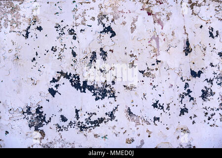 White obsolete cracked painted texture background close-up Stock Photo
