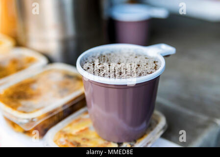 Close up brown plastic cup with take out tea Stock Photo