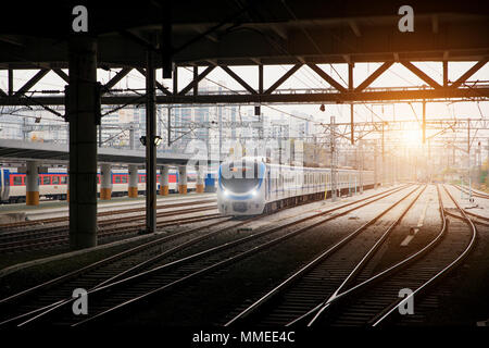 Korea train on railway with skyline at Seoul, South Korea for transportation background Stock Photo